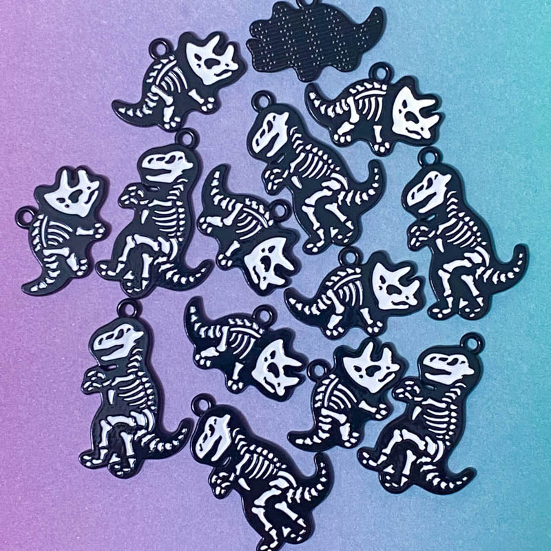 black and white metal dino dinosaur dinosaurs skeleton skeletons charm charms pendant pendants t-rex t rex triceratops cute kawaii craft supplies uk monochrome bold big large