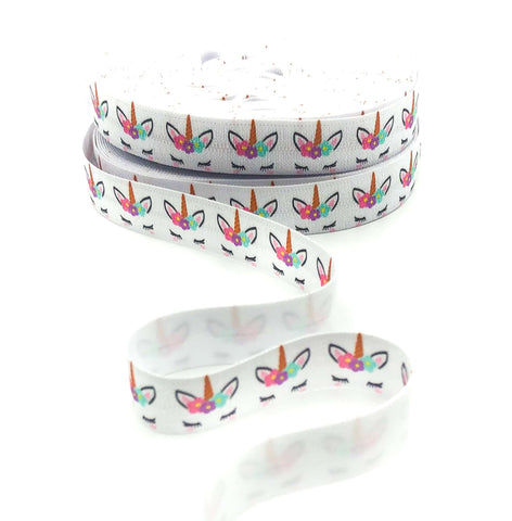 floral unicorn heads on white fold over elastic 15mm wide ribbon yard uk craft supplies fold over elastics white flower unicorns ribbon