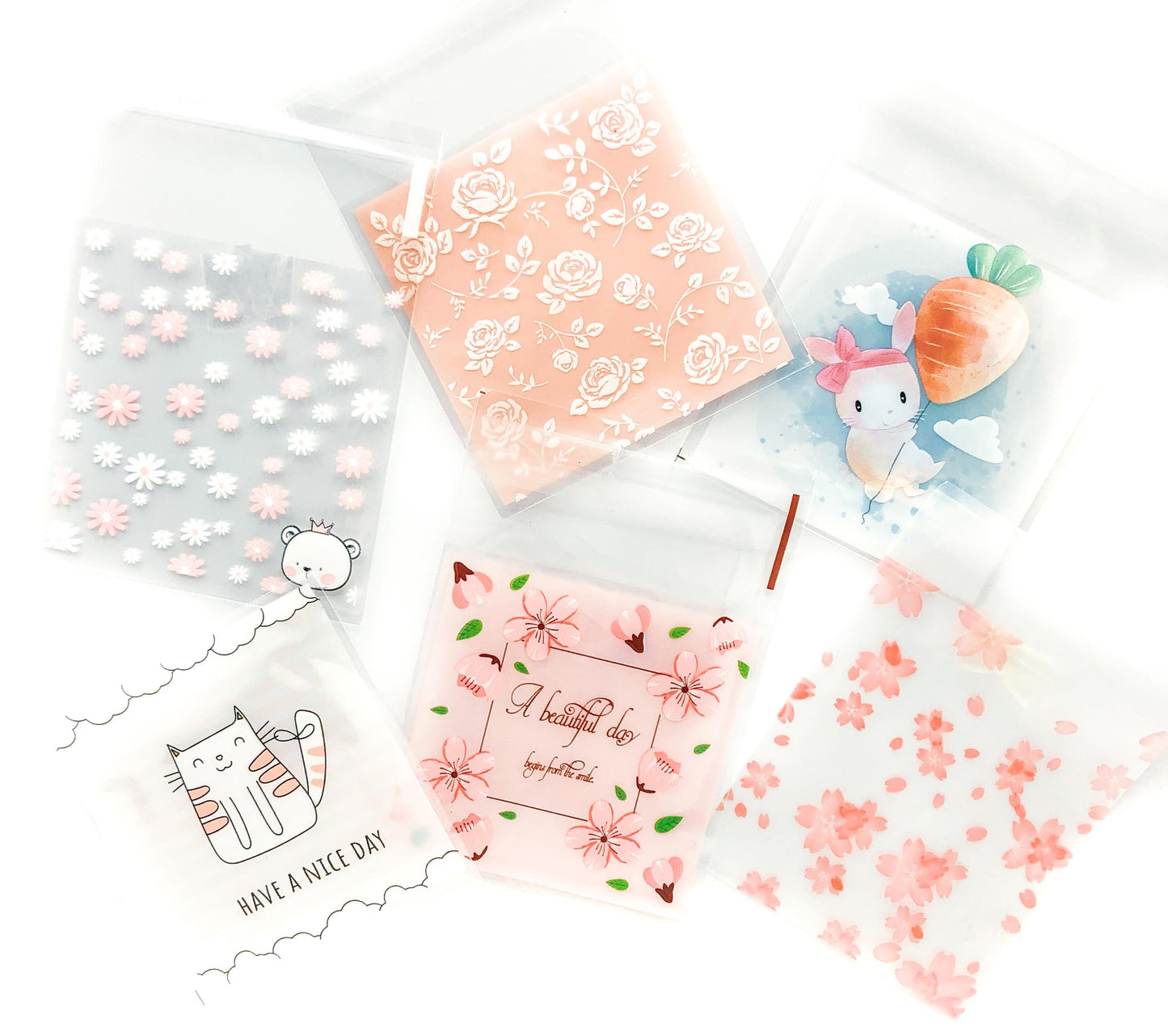 pink and pretty floral spring cello cellophane bag bags clear printed packaging supplies cat cats bunny rabbit rabbits easter rose cherry blossom uk 