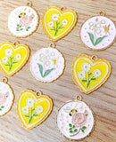 spring charms enamel charm heart hearts yellow pink flower flowers bee bees butterfly gold tone metal daisy rose butterfly uk craft supplies large big pendant