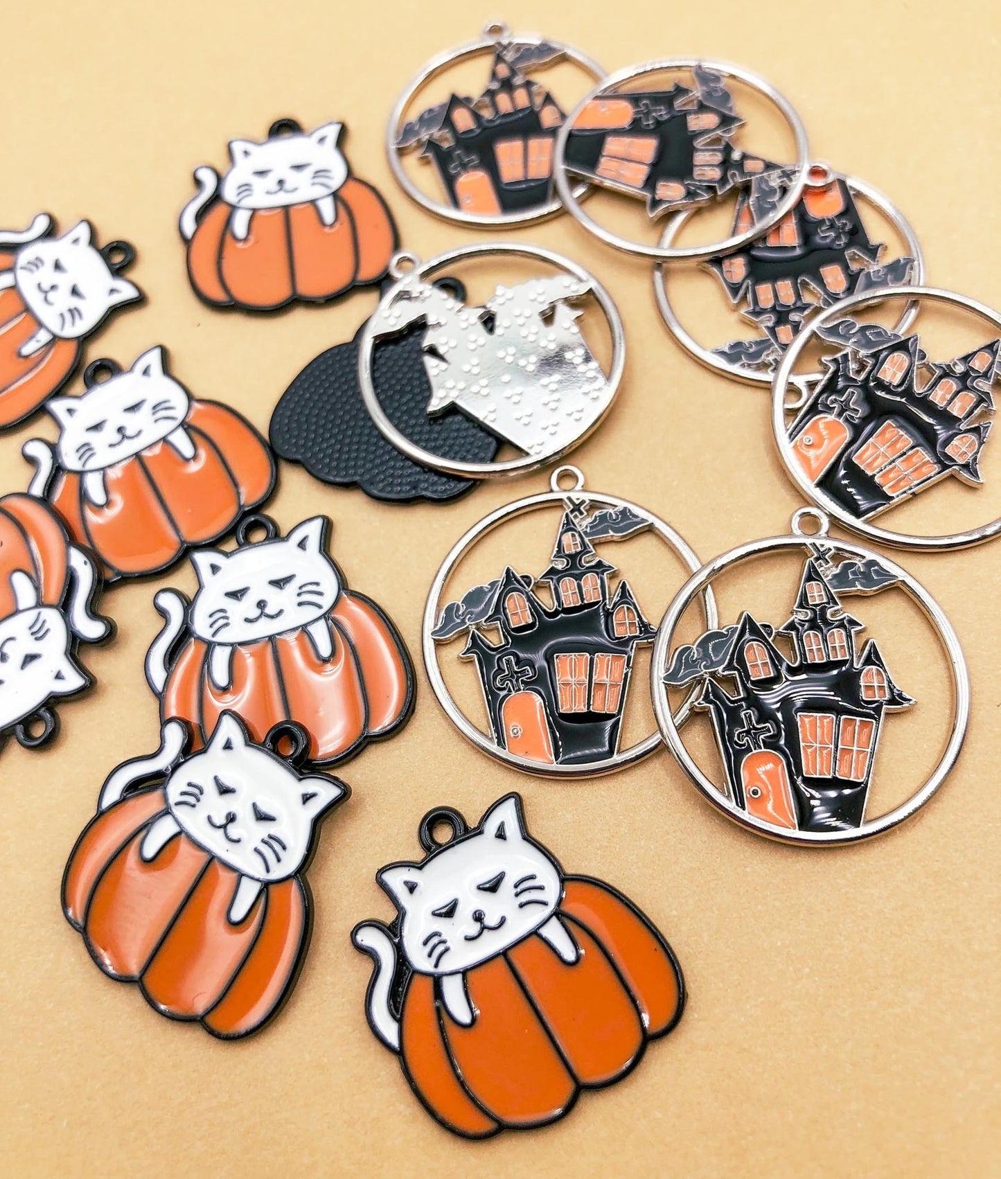 pumpkin cat orange and black haunted house silver tone black metal charm charms uk cute kawaii craft supplies enamel enamelled spooky halloween cats white cat black orange