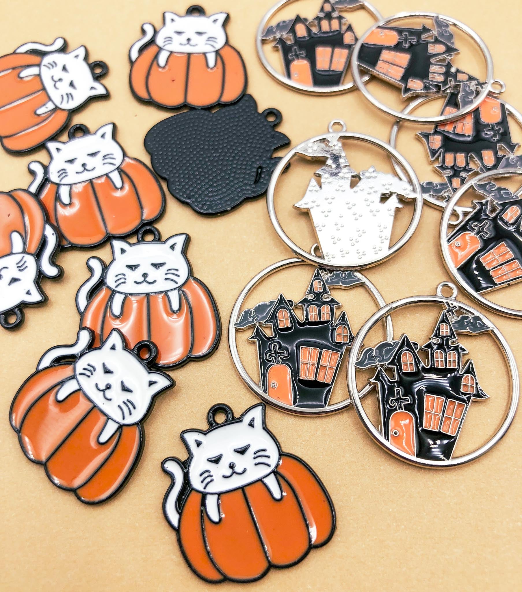 pumpkin cat orange and black haunted house silver tone black metal charm charms uk cute kawaii craft supplies enamel enamelled spooky halloween cats white cat black orange