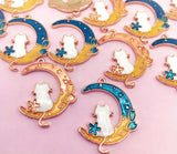 cat in the moon gold tone metal enamel enamelled charm charms pretty white cats crescent moons uk kawaii craft supplies teal rose pink flower turquoise