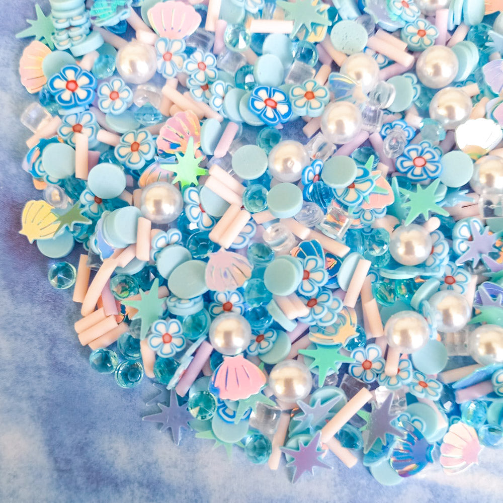 mermaid theme blue white turquoise pearl sprinkles mini decoden flatback fb fbs flat back backs bundle uk cute kawaii craft supplies polymer clay flower flowers sequins stars shell shells gems gem pale pink